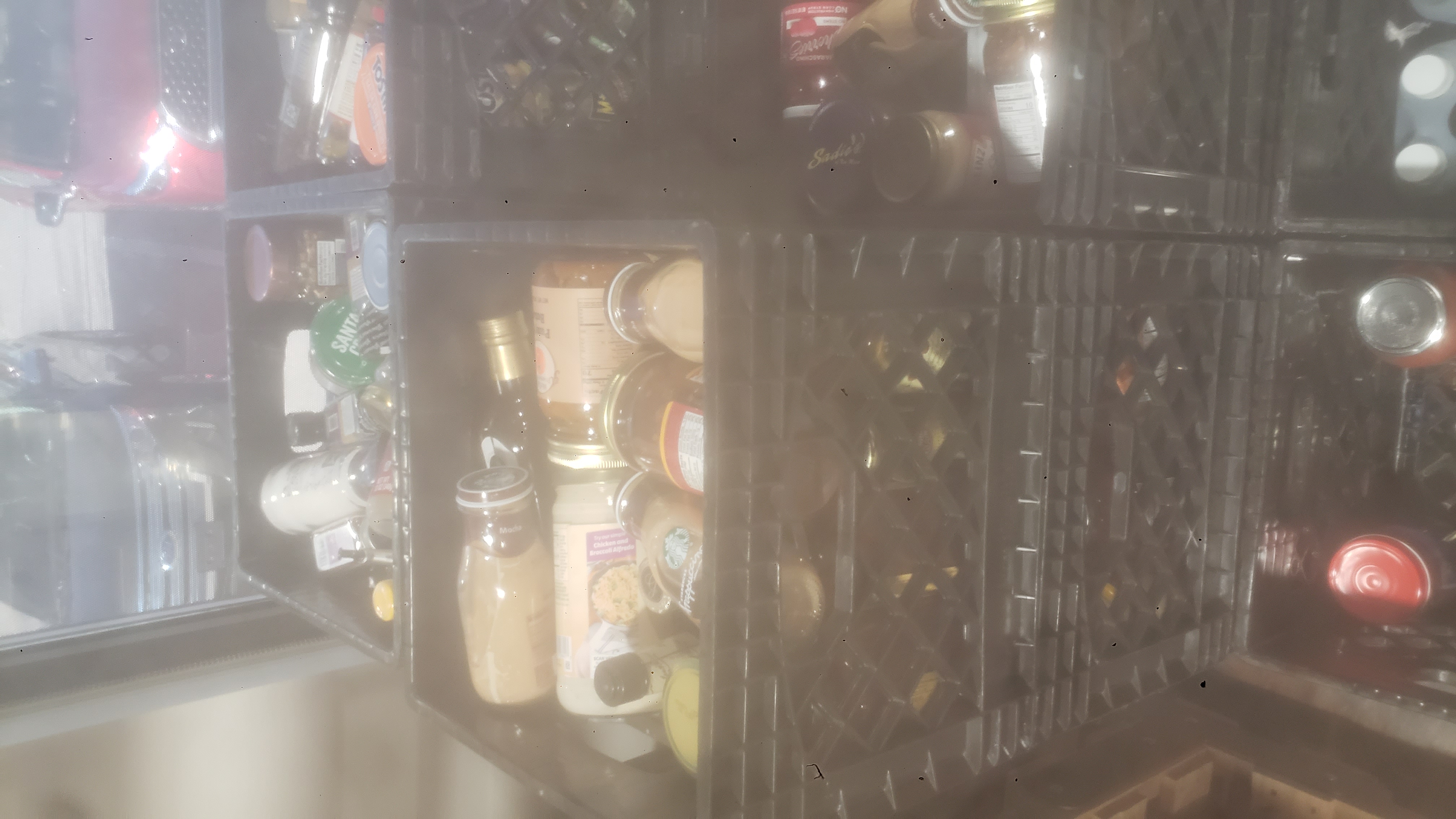 Crates filled with glass jars.